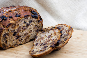 cutting fruit bread  on the wooden cutting board