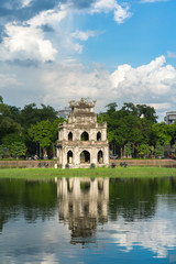 Naklejka premium Turtle Tower (Thap Rua) in Hoan Kiem lake (Sword lake, Ho Guom) in Hanoi, Vietnam.