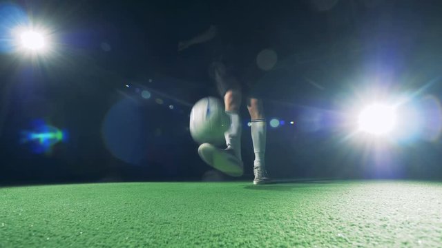 World cup concept. Soccer palyer preforms impressive dribbling tricks.