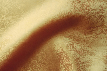 gold closeup organza fabric wavy texture