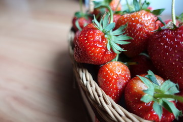A Ripe strawberries  in the basket, red fruit, plant in countryside farm, feel fresh and sweet, fruit macro photography concept