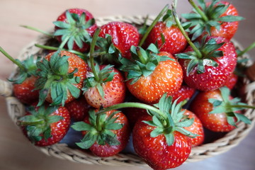 A Ripe strawberries  in the basket, red fruit, plant in countryside farm, feel fresh and sweet, fruit macro photography concept