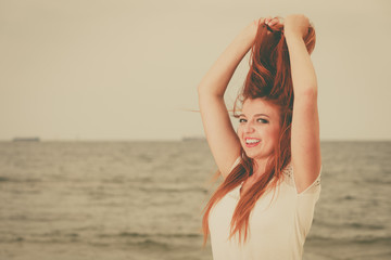 Fototapeta na wymiar Portrait of beautiful redhead adult woman