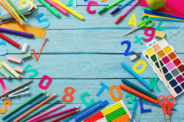 Back to school concept on wooden background