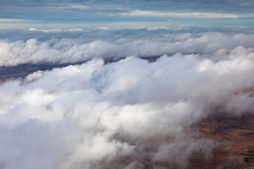 Obraz premium Flight above the clouds
