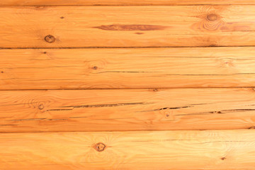 Wall of logs in the bath. Background of natural wood