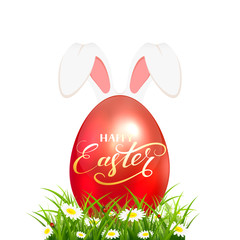 Easter egg in grass with rabbit ears on white background