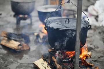 Cauldrons over the fire
