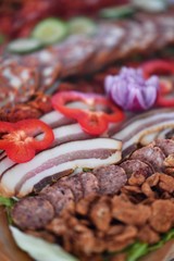 Meat pork cooked on various way on the plate