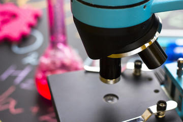 Chemistry class makes chemistry experiment. STEM. Robotics, mechanic, chemistry, biology. Modern education. Fun and interesting Blackchark board background