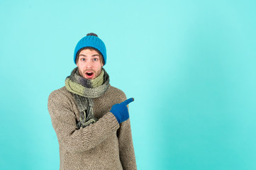Macho in warm hat, sweater, scarf, fashion