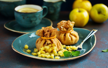 Russian pancakes stuffed with apples and caramel.