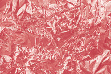 Rose Gold foil shiny texture, abstract red wrapping paper for background and design art work.