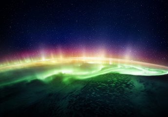 View of the planet Earth and Northern lights from space. Elements of this image furnished by NASA.