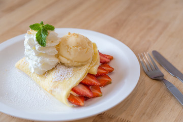 Strawberry Crape and vanilla ice cream