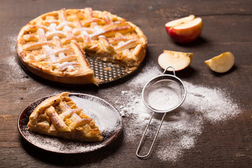 Apple  Pie on wooden table surface