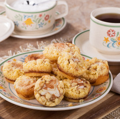 Pile of cinnamon cream cheese coffee cake on a plate
