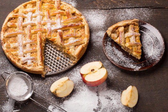 Apple  Pie on wooden table surface