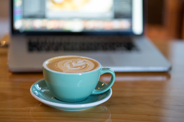 Fototapeta na wymiar Coffee Latte Laptop Background