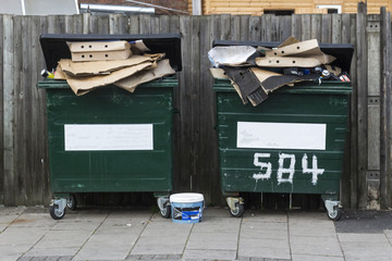 Two filled dumpsters