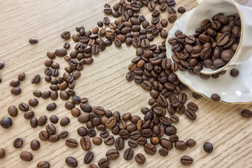 Coffee beans shaped heart and cup with coffee beans, concept, love