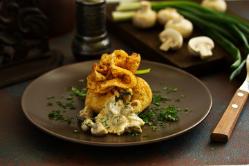 Russian crepes stuffed with mushrooms and cheese.