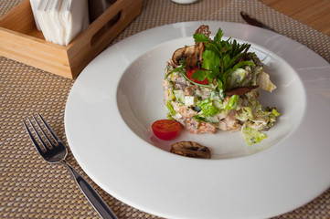salad with mushrooms and meat vegetables with mayonnaise sauce