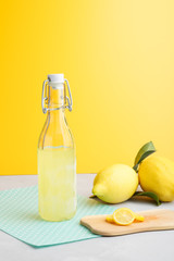 llemonade on a light background. summer traditional Italian home-made drink from Sicilian lemons. a drink of yellow color. articles made of fruits. summer background with a picture of a drink