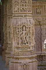 Fototapeta na wymiar Carving details on the pillar of the Sun Temple. Built in 1026 - 27 AD during the reign of Bhima I of the Chaulukya dynasty, Modhera, Mehsana, Gujarat