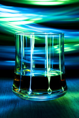 A glass of cognac on the table.