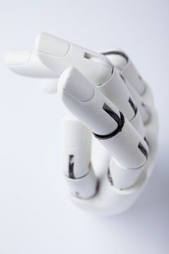 Hand of a robot on a white background.