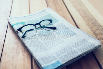 Glasses with Newspaper