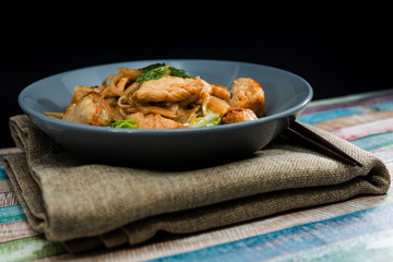 wok fried chicken stir fry with sweet peppers and chinese vegetables