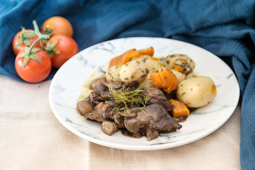 Beef meat stewed with potatoes-Traditional French cuisine Beef Bourguignon potatoes carrots in persillade