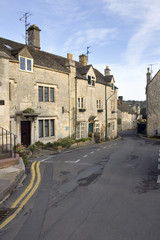 Fototapeta na wymiar England, Gloucestershire, Cotswolds, Painswick, cotswold stone houses, autumn sun, street scene