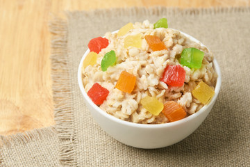 Oatmeal with dried fruits. Bright colors. Useful breakfast