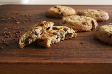 cookies with chocolate on a wooden background