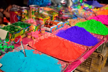 Colourful piles of powdered shopping for Holi festival 
