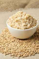 Raw porridge. Neutral light background. Welded porridge