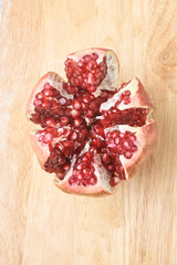 Ripe red garnet. Small grains. Fresh Fruit