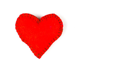 Heart made of fabric on a white background.