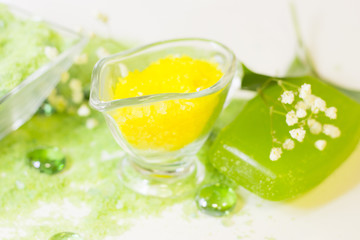 Spa concept with green bath salt
