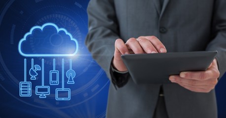 Hand holding tablet with cloud icon and hanging connection