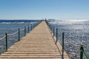 Obraz premium pier on the sea shore