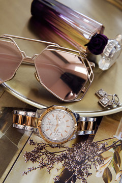 Set of Women's accessories - Sunglasses, watches, perfume bottle, sunglasses, mascara, phone