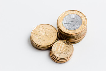 brazilian real coins in white background