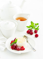 Delicious home-made dessert Panna cotta. Cream-caramel, caramel custard, with raspberries.