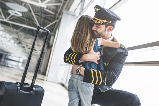 Pilot with daughter in airport