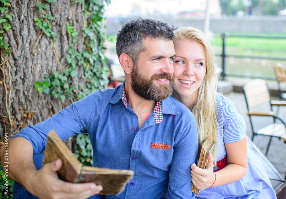 Wall mural Girl with happy face fall in love with bearded man,