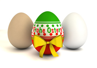 Buntes Osterei mit gelber Schleife und zwei natürlichen Eiern